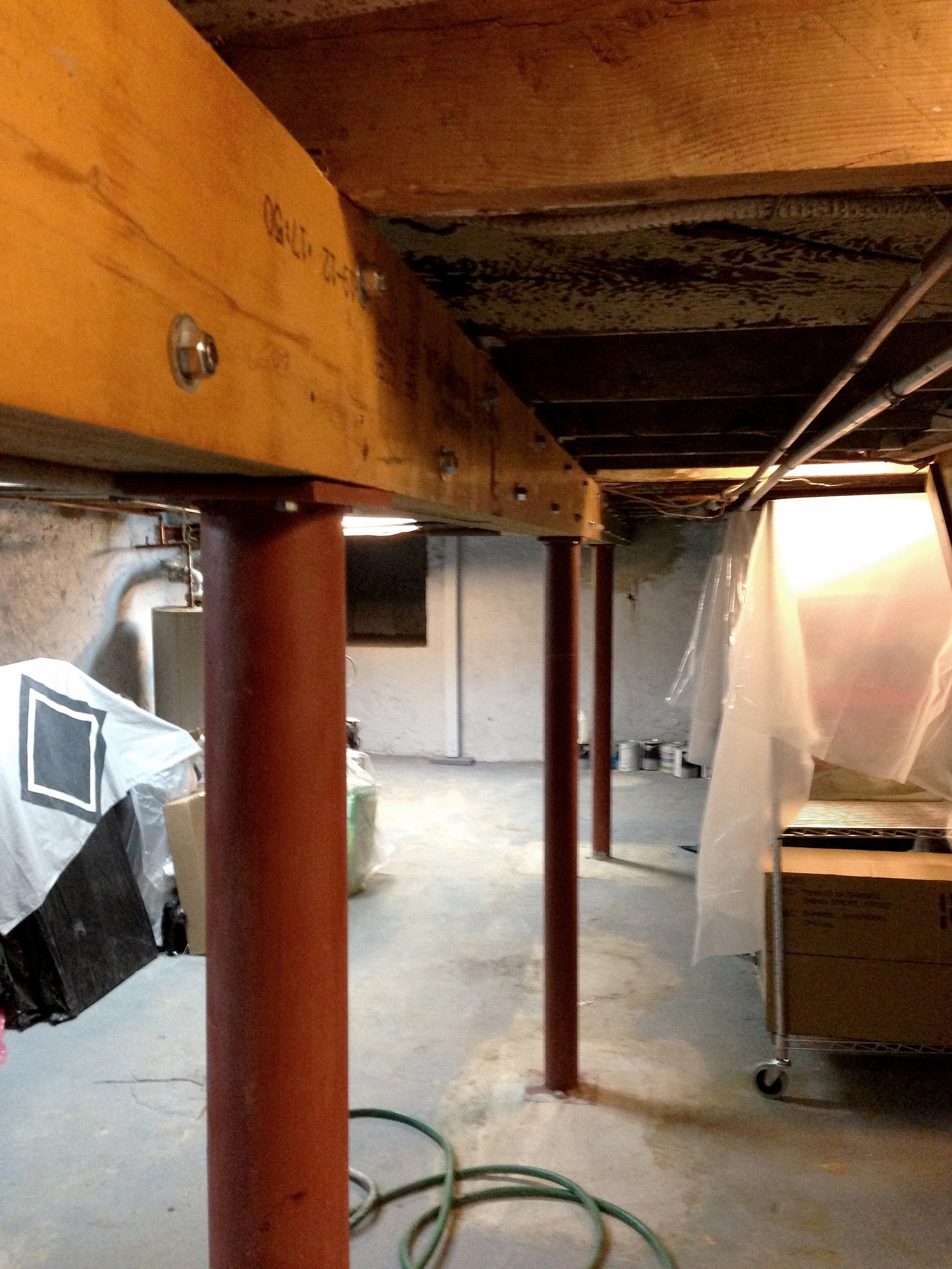 NEW STRUCTURAL COLUMNS AND BEAMS AT THE CELLAR