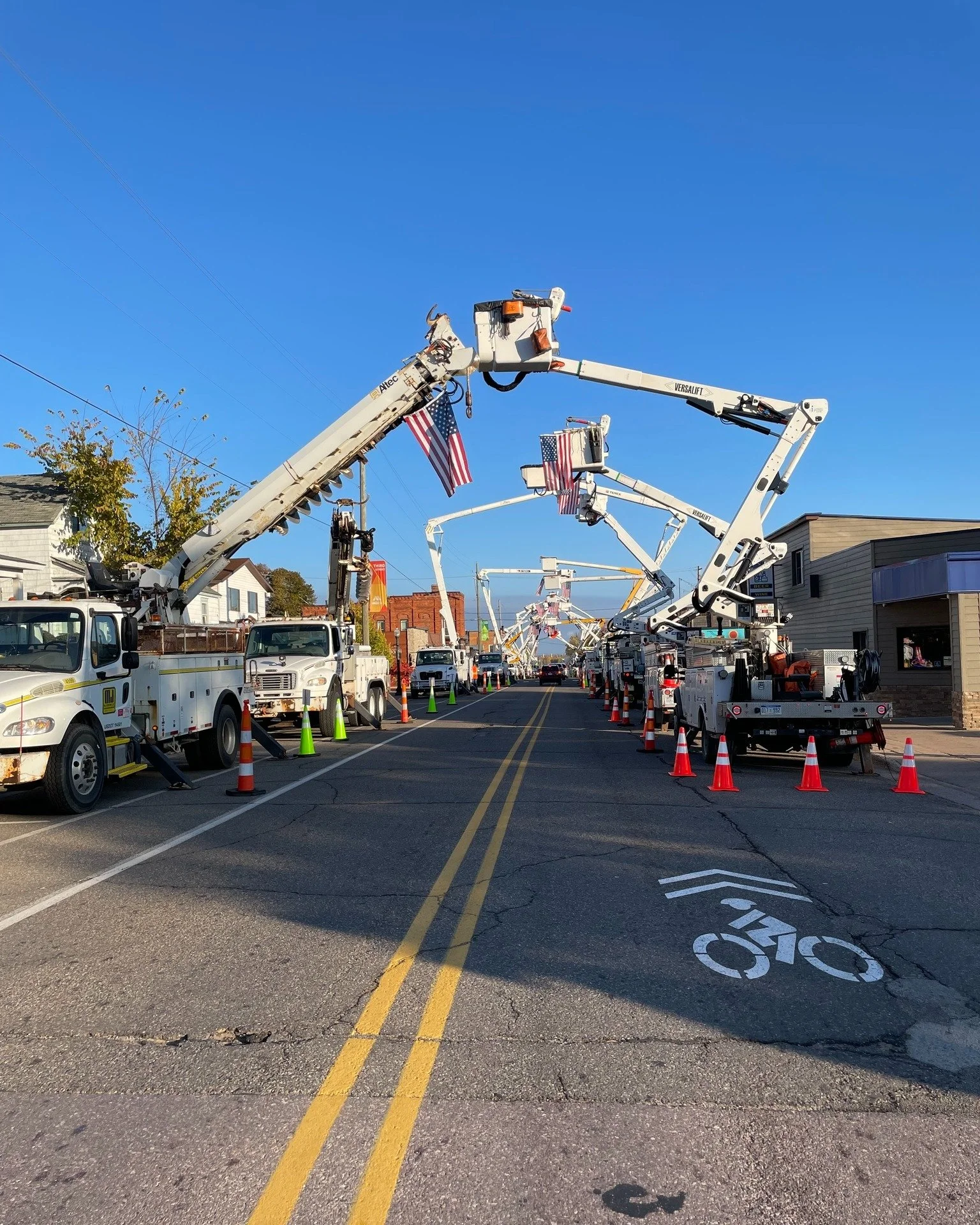 Today, our community honors the lineman who tragically lost his life in last week&rsquo;s accident on M-553. Trucks line Third Street in a heartfelt memorial to his service and dedication.

🚧 Third Street remains open to traffic during this memorial