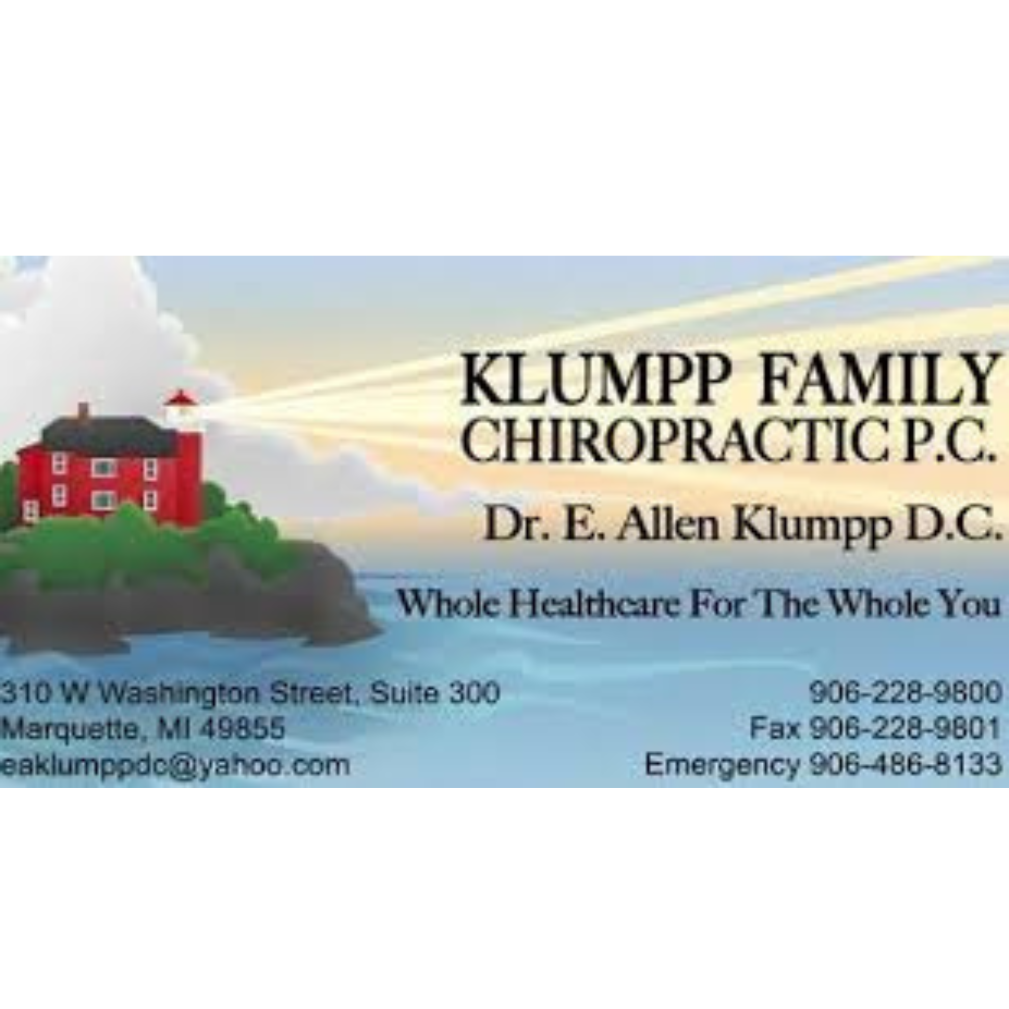 Klumpp Family Chiropractic business card with Marquette Harbor lighthouse graphic.