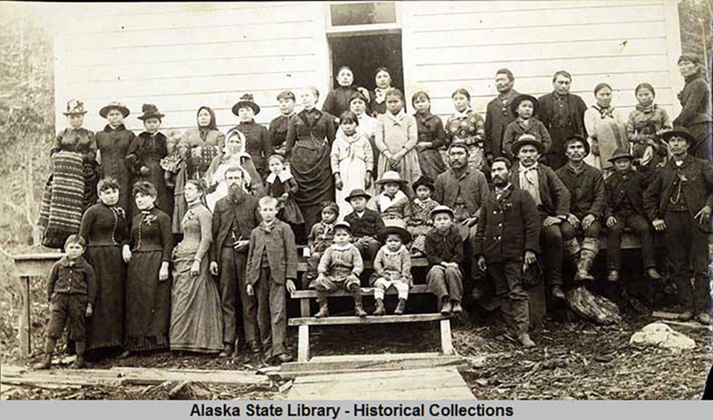  Photo of Native children and the Quaker missionaries and staff at the Douglas Island Friends Mission School.  
