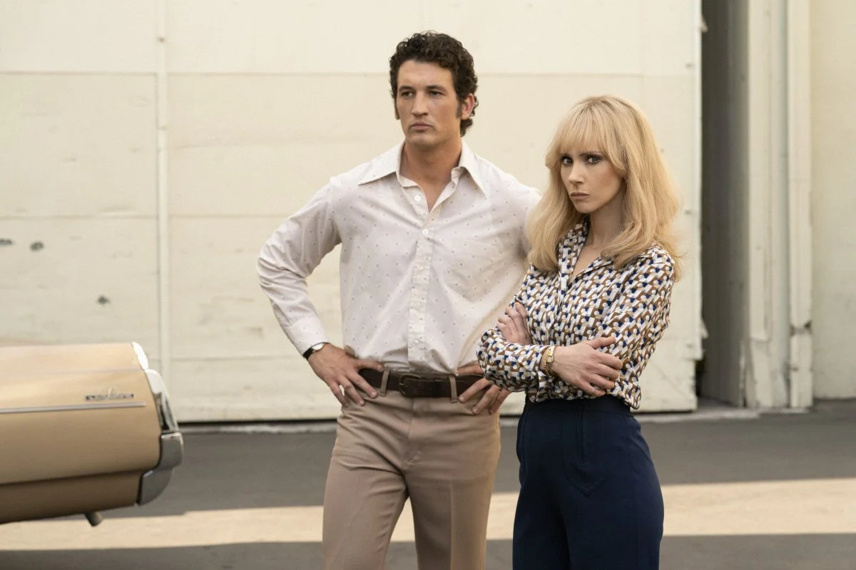 Miles Teller as Al Ruddy and Juno Temple as Bettye McCartt in The Offer.jpg