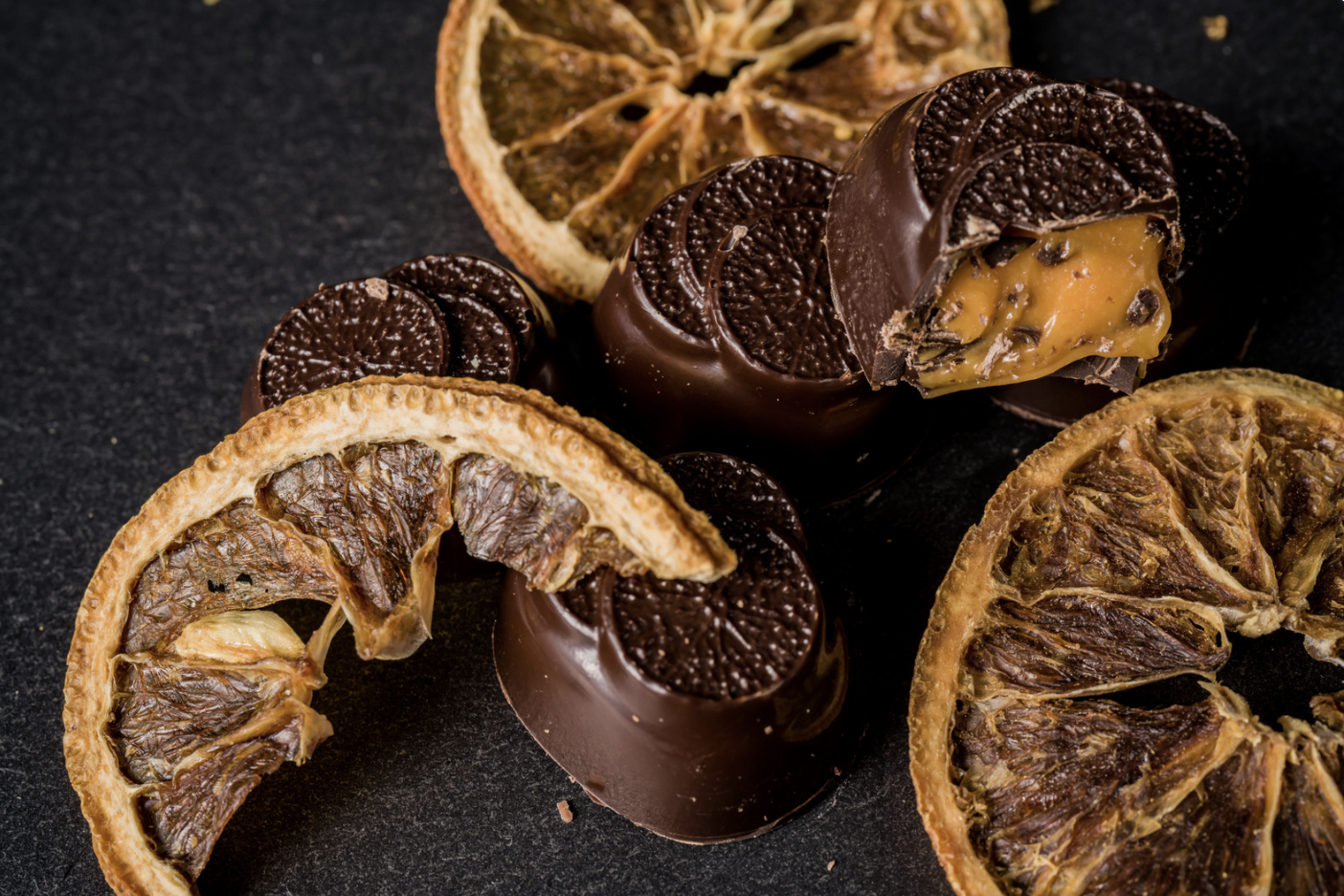 dark chocolate caramels and dried orange slices