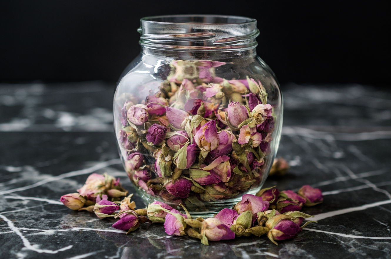 jar of dried rosebuds