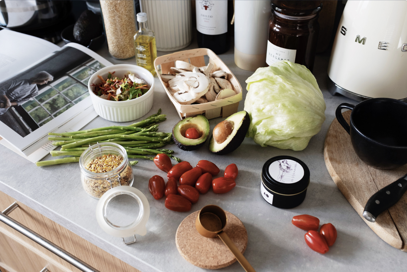 various ingredients laid out on white marble counter