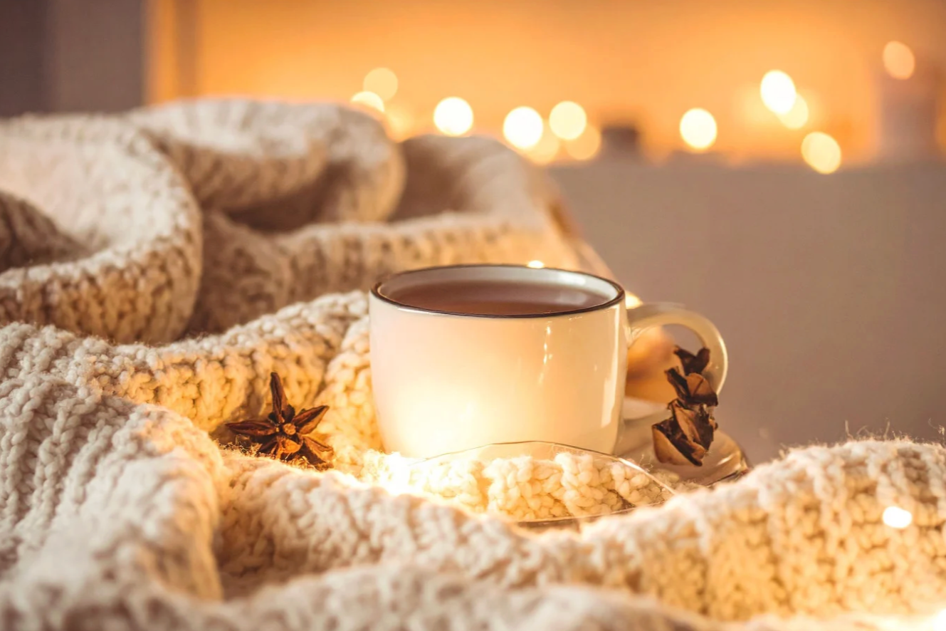 mug of hot tea with blanket