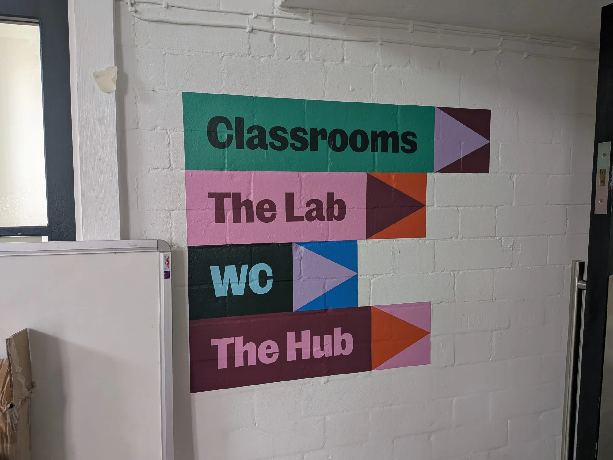  Wayfinding directional wall vinyl installed at The Green Independent School 