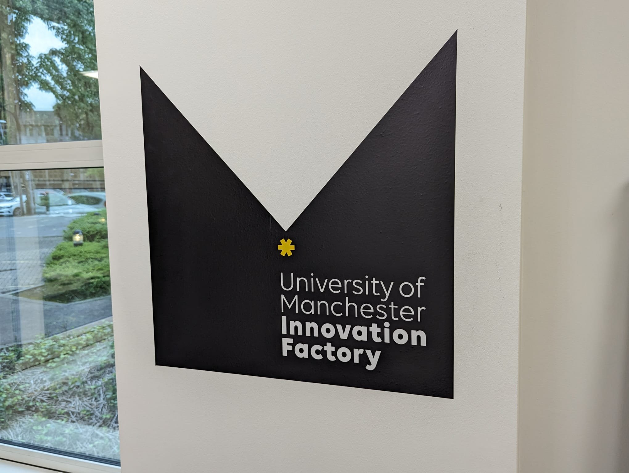 University of Manchester Innovation Factory Logo installed using wall vinyl.