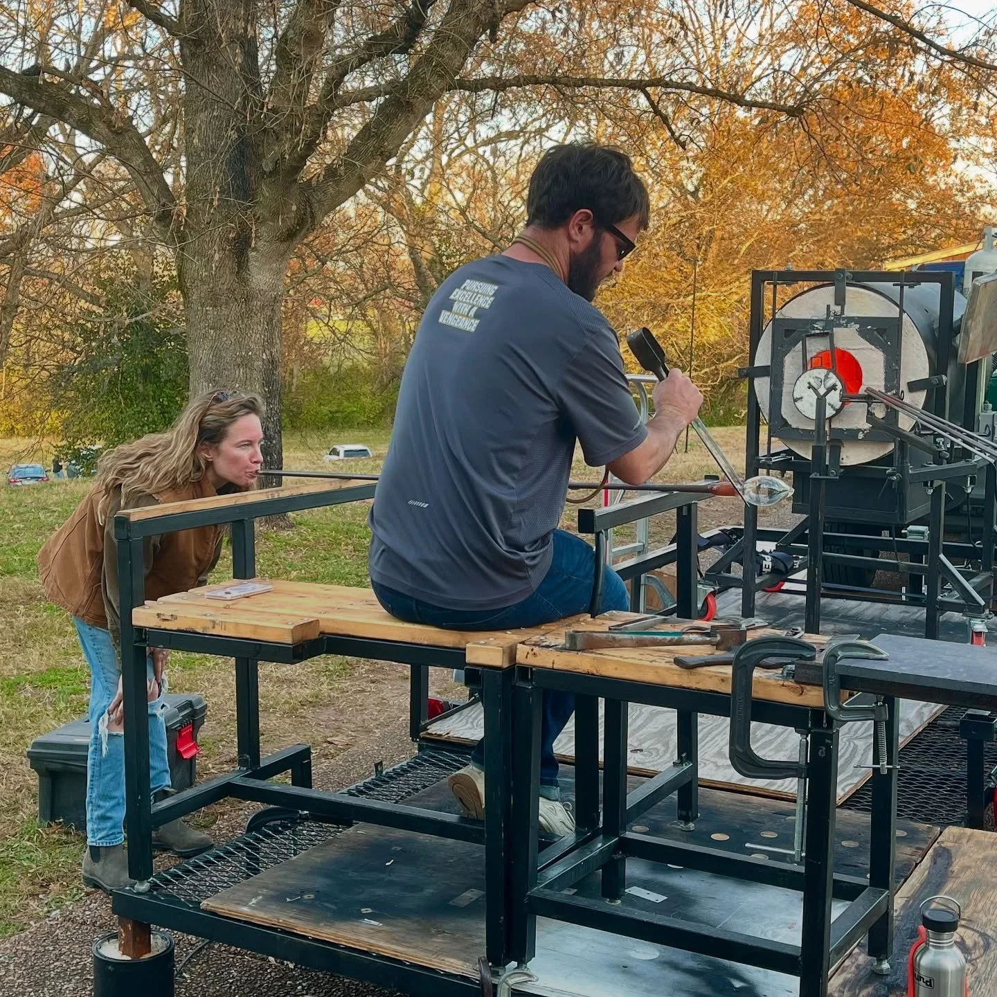 Despite a trailer tire blowout in the early morning hours along rte 40 heading west from Asheville, Blaine and Sam Spees  made to the Copper Fox Gallery by early afternoon.  With the harrowing experience behind them, Blaine and Sam got things fired u