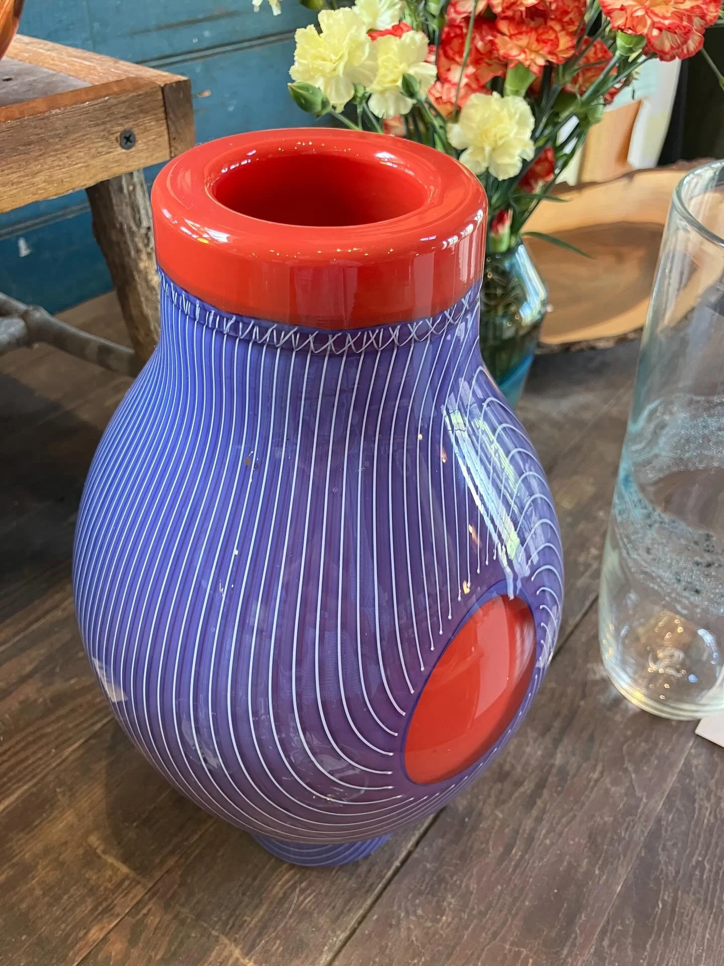 Husband and wife Sam and Blaine Spees create a beautiful array of both functional and sculptural glass.  The shape, lines, pattern and colors of this vase reflect the skill level of this team.  Together they produce a spectacular variety of blown gla