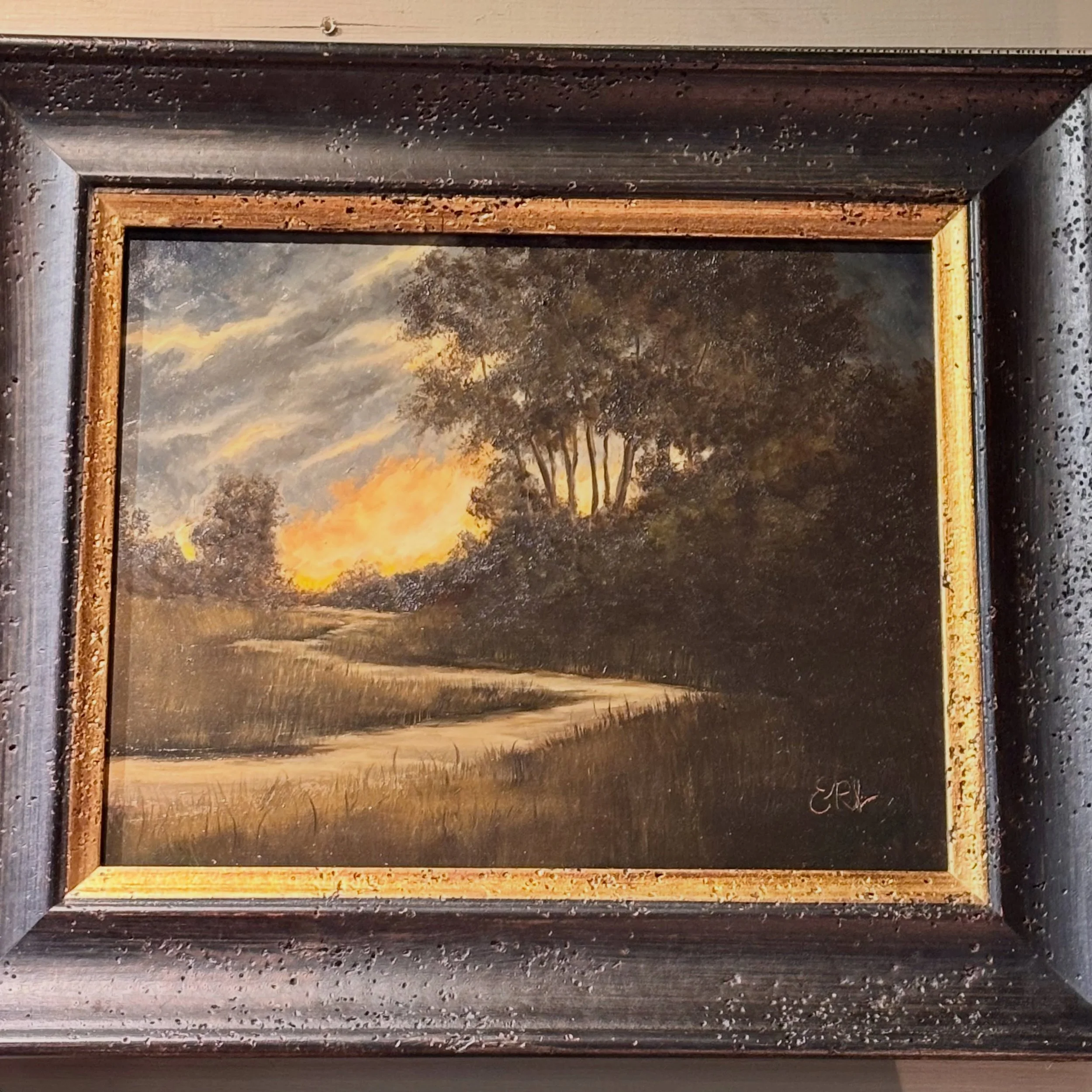 This young artist&rsquo;s exceptional oil paintings capture scenes in nature that make one exhale and relax as only quiet isolated places can.  Her dark, shadowy palettes capture the solitude and serene aspects of places where we seek to relax and re