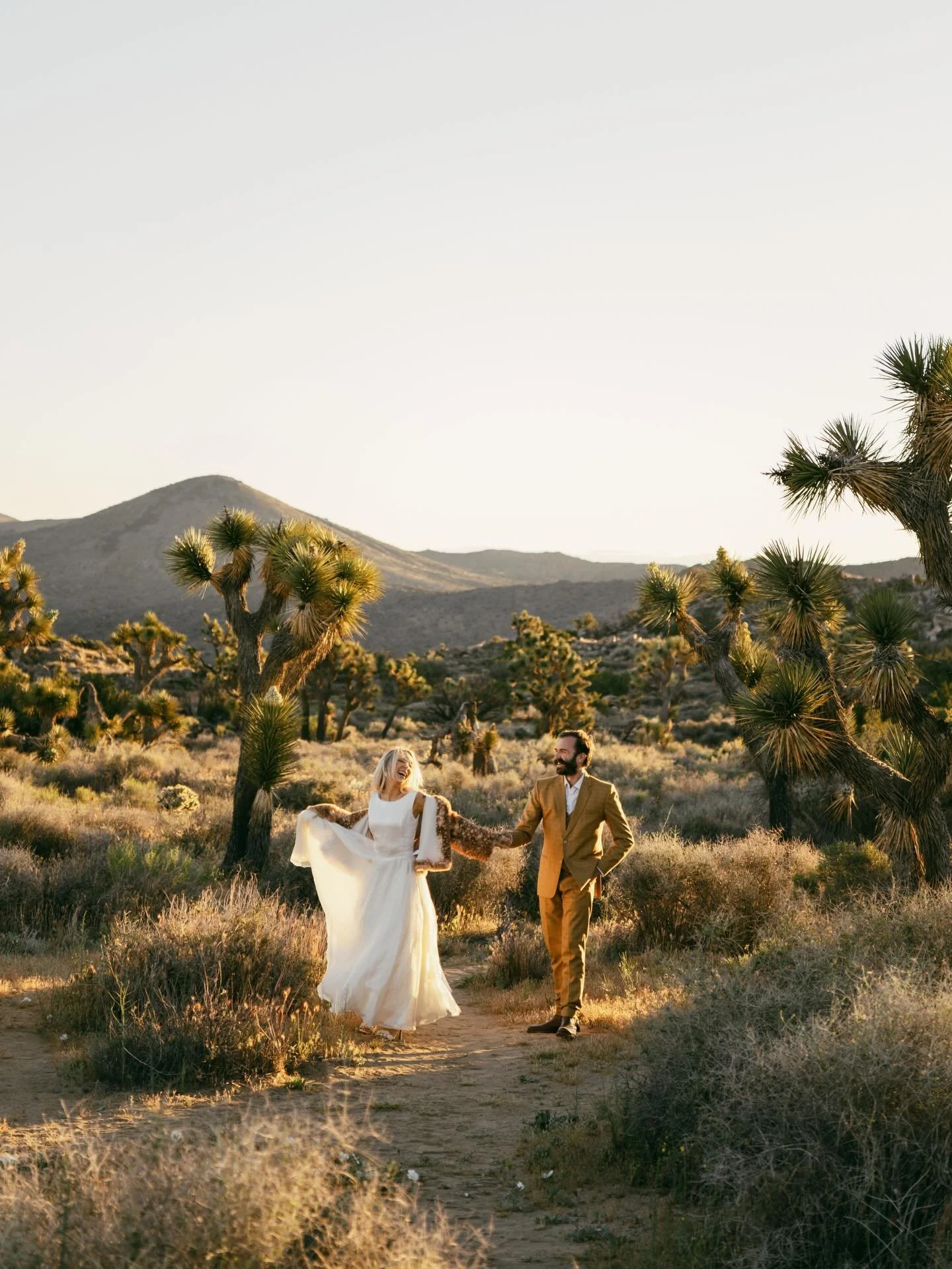 First time back in this national park since April 2019, and my first time photographing a couple here. You know what? I hope it&rsquo;s not my last ✨

I loved being back in the desert! I loved the wind whipping up chaos and the warm glow of sunrise. 