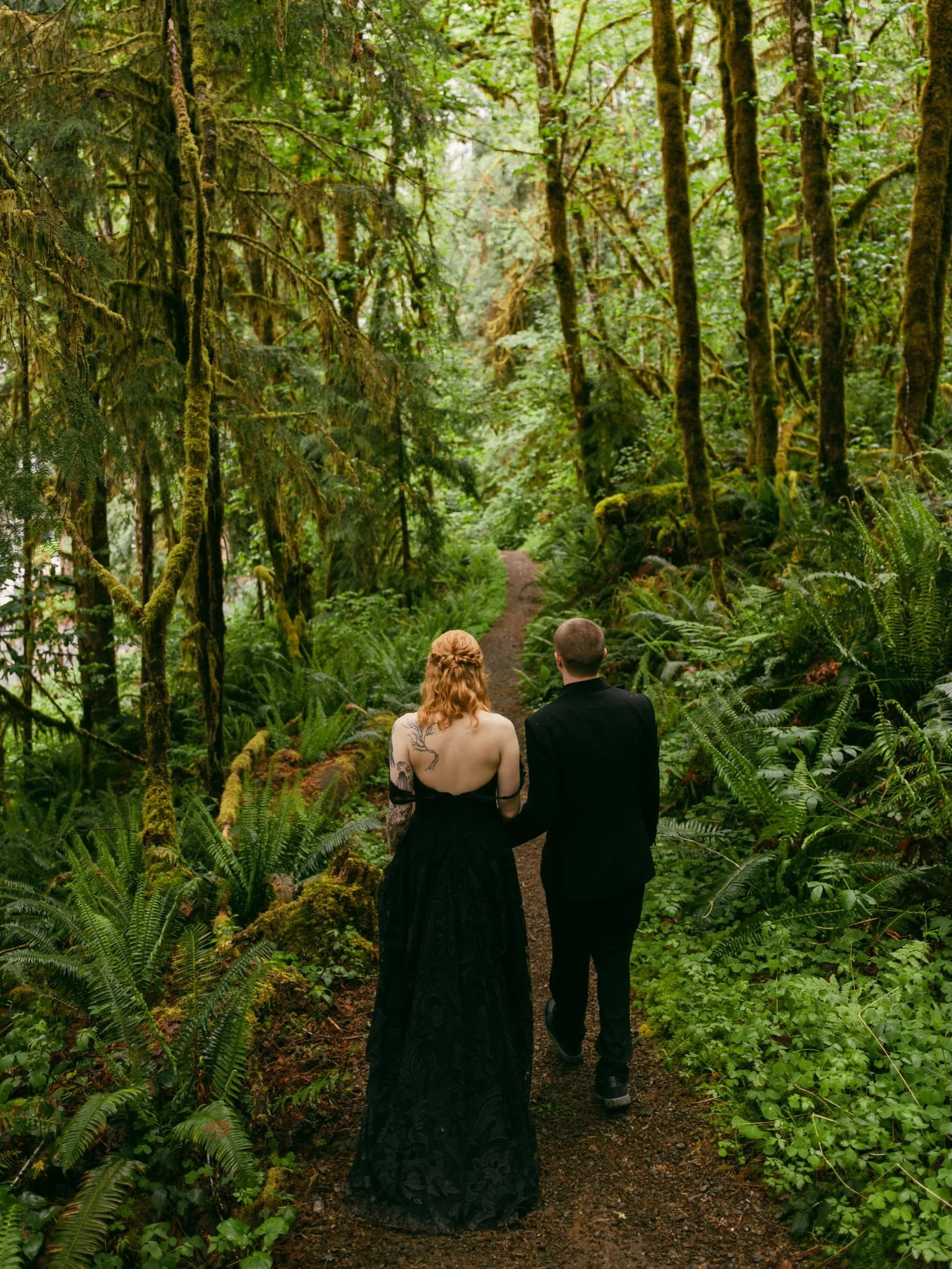 What started out as perhaps one of the rainiest days I&rsquo;ve ever photographed in Washington turned into a lovely, sunny ceremony!

A stranger (not a wedding guest) walked up to me in the lobby of the Lake Quinault Lodge about 30 minutes before th