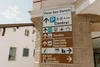 Signposts In Seceda How to Visit the Seceda Ridgeline in the Dolomites (Local's Guide)