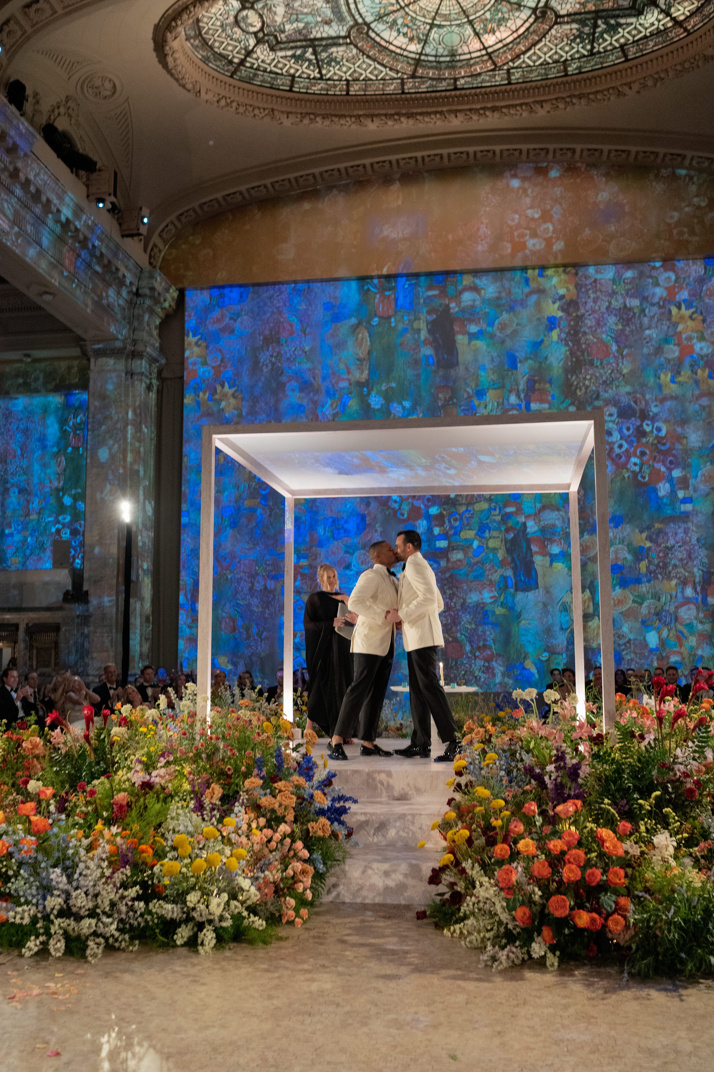 The lights changed when they kissed. Hall des Lumières, New York City.