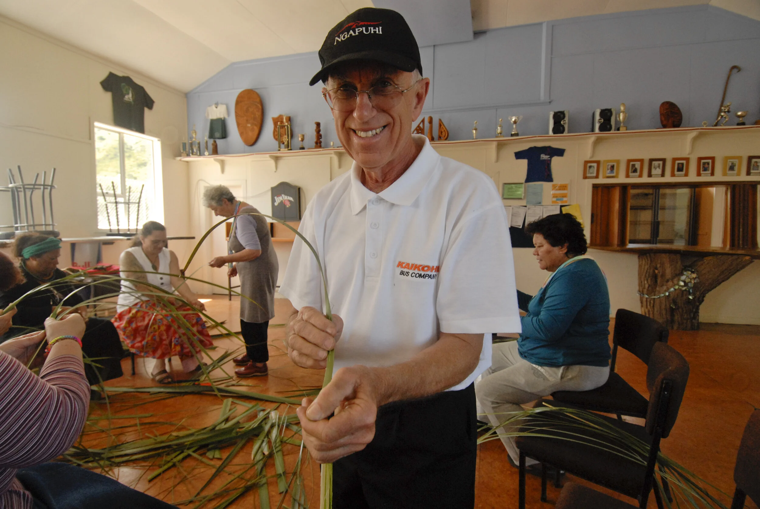 Our lovely Bus driver joins in the weaving