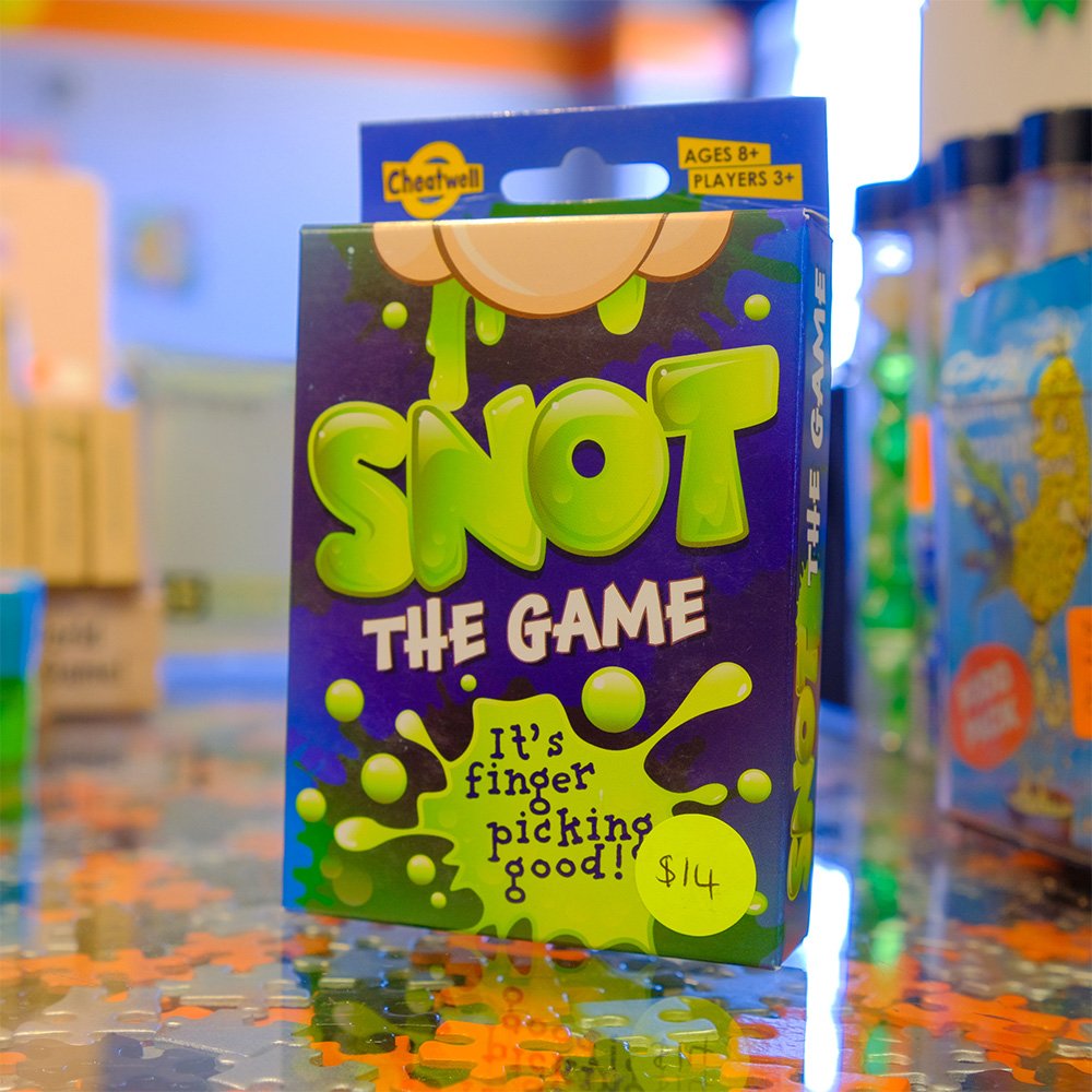 snot tuckbox front solve it and escape.jpg