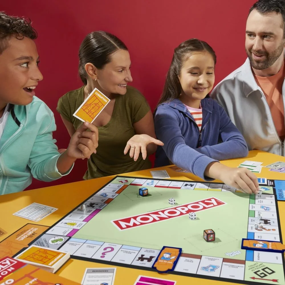 monopoly-go-to-jail-expansion-add-to-classic-monopoly-game-family-games-ages-8-40-mins_6-edit.jpg