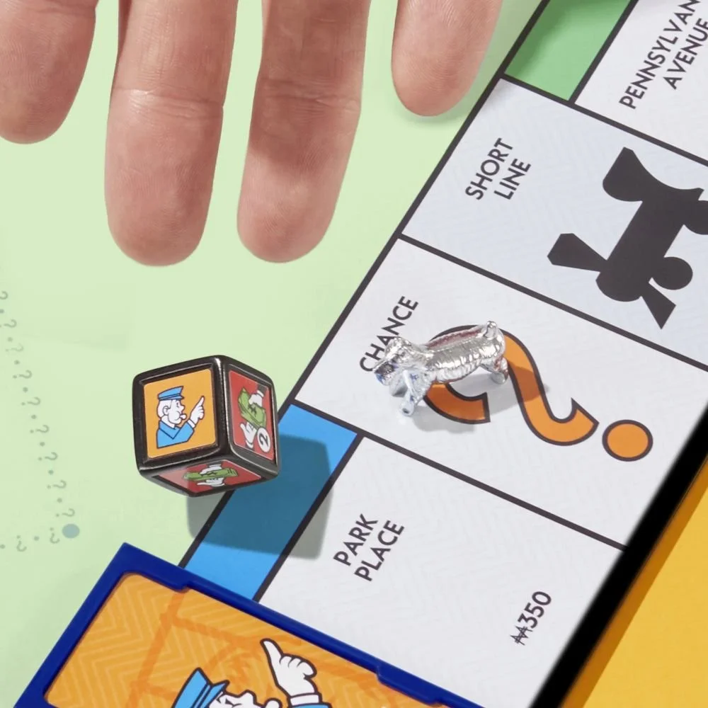 monopoly-go-to-jail-expansion-add-to-classic-monopoly-game-family-games-ages-8-40-mins_5-edit.jpg