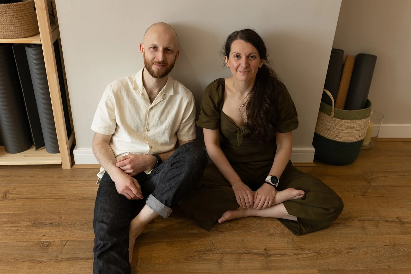 Kevin and Bronwyn founders of Folc, sat on the floor in the studio