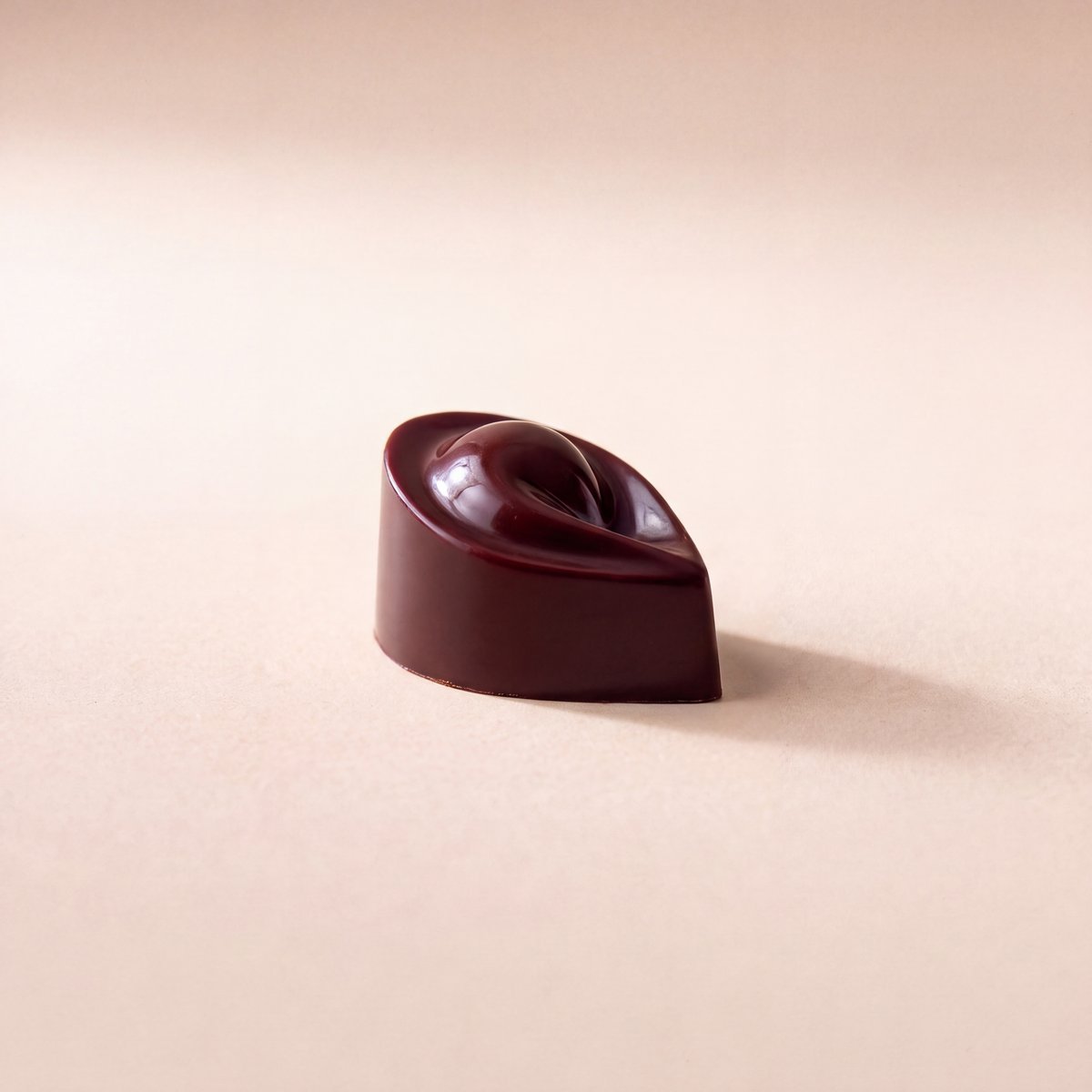 Dark chocolate tortellino made by Alessandro Luppolo for Trattoria Emilia