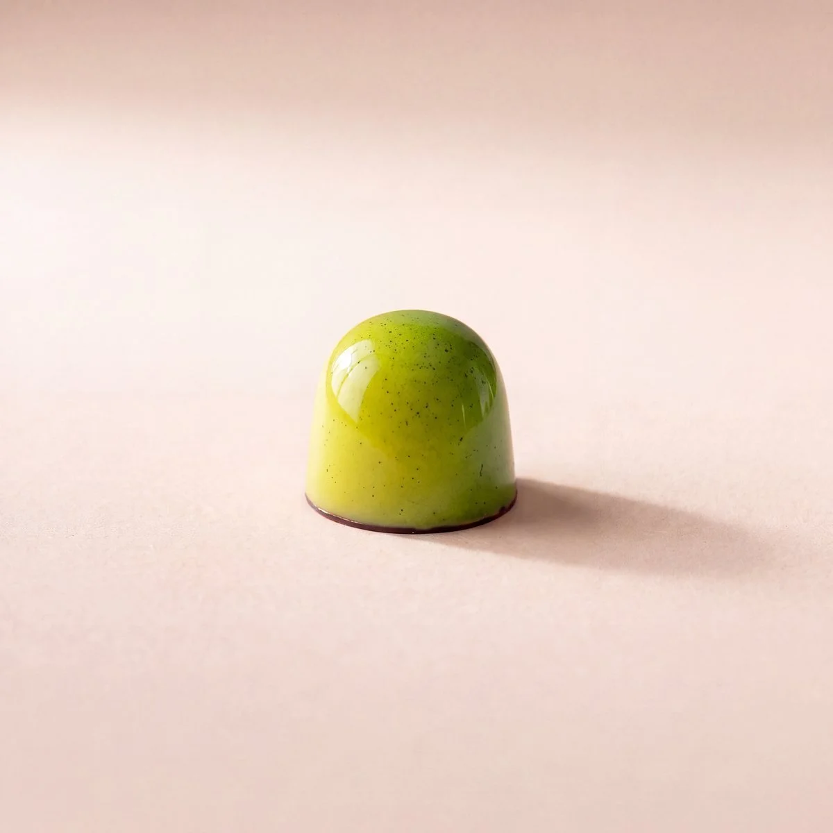 Pineapple Jam and Rosemary bonbon, glossy green shell