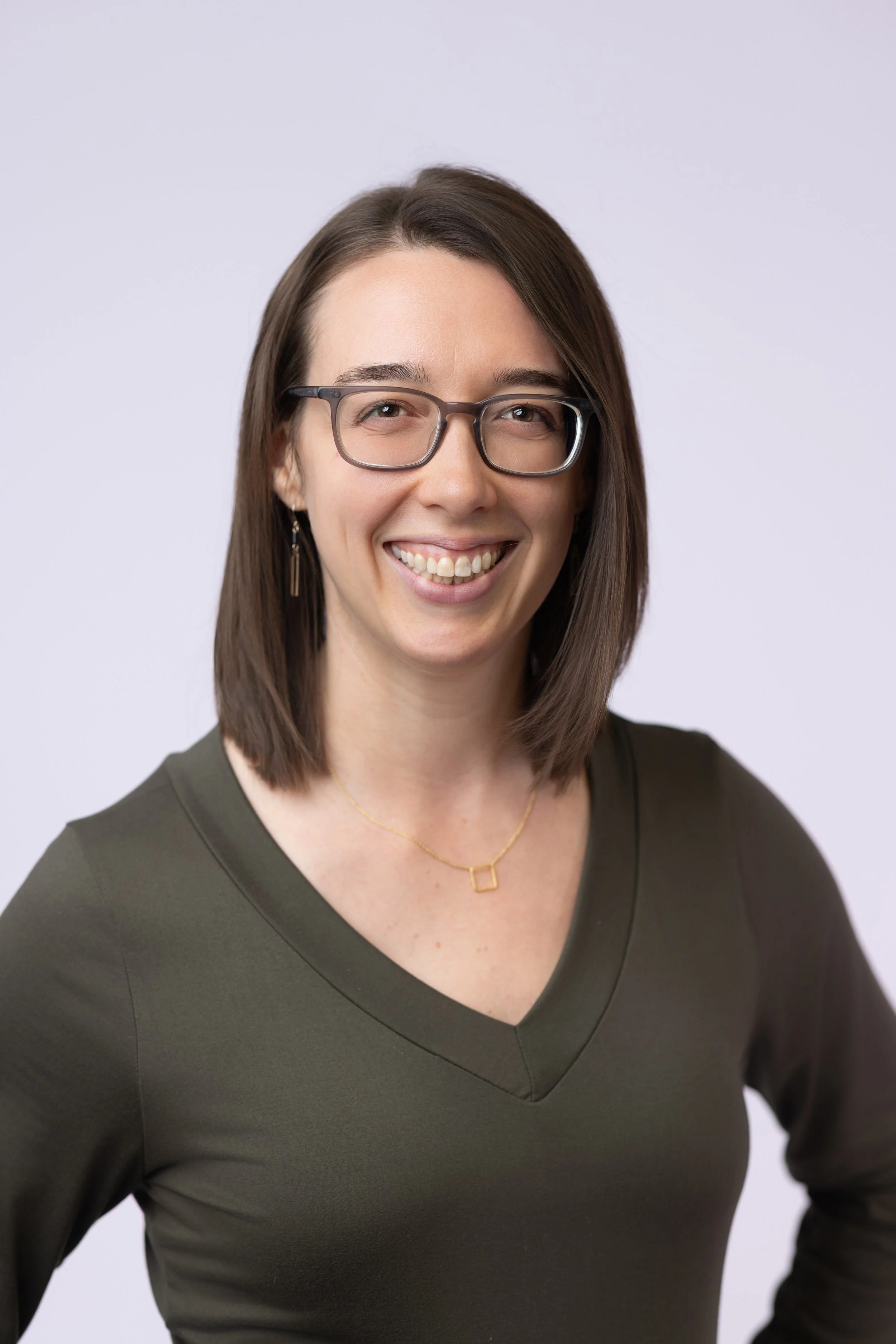 Geometric drawing of an outline square with sections divided by vertical, horizontal, and circle lines.