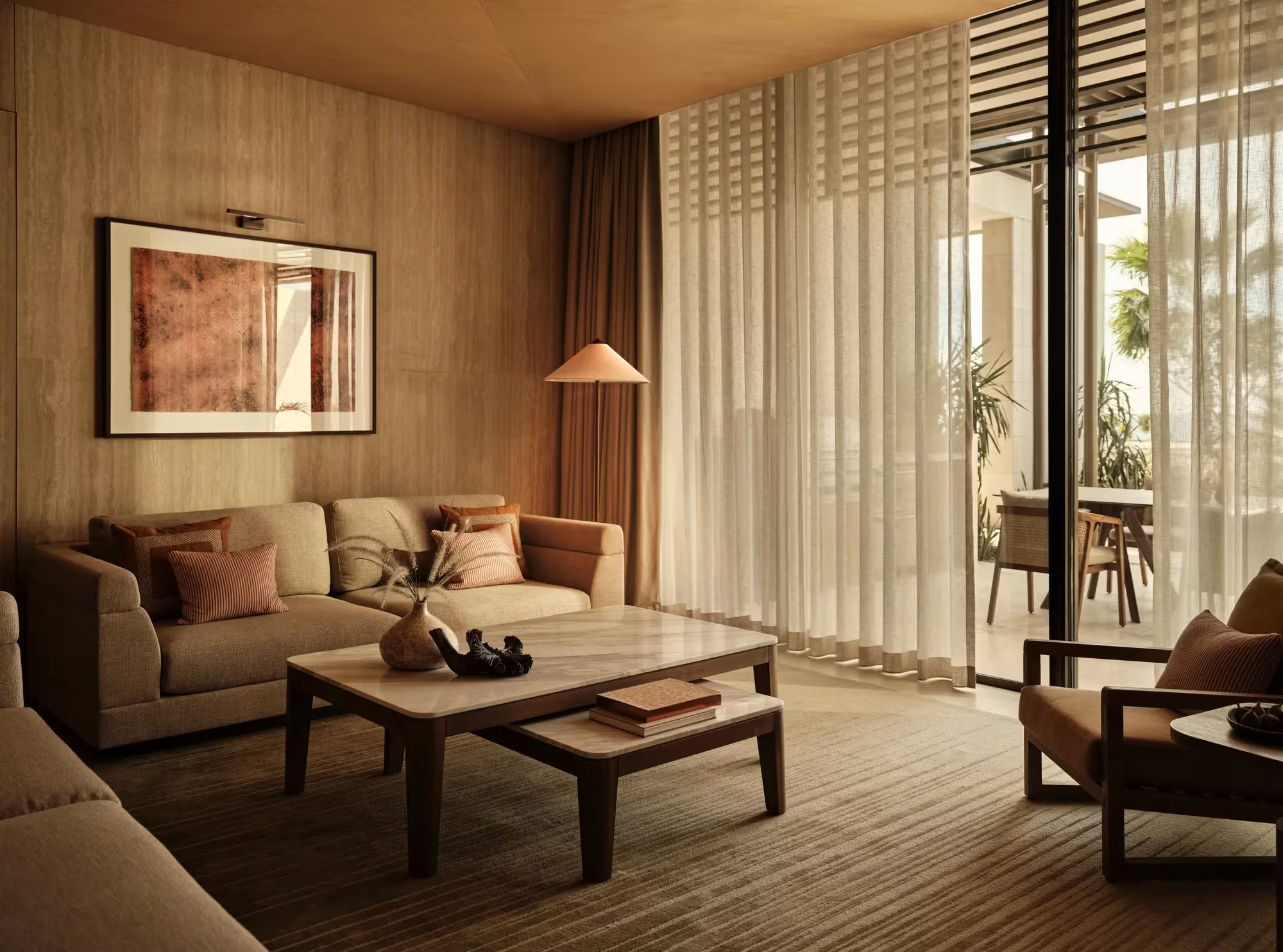 RWAML_Facilities_Room_SeaViewOneBedroomPrivatePoolVilla_LivingRoom (1).png