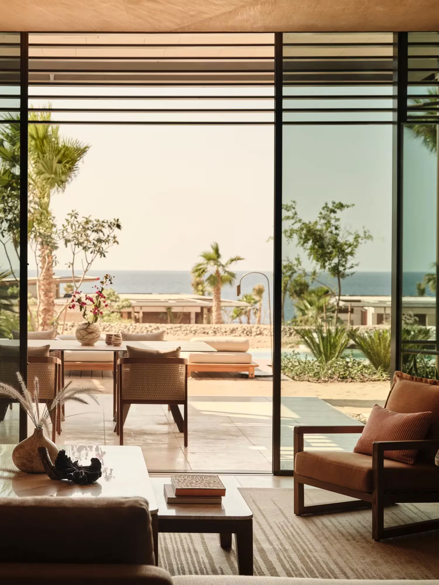 RWAML_Facilities_Room_SeaViewOneBedroomPrivatePoolVilla_LivingRoom_View (1).png