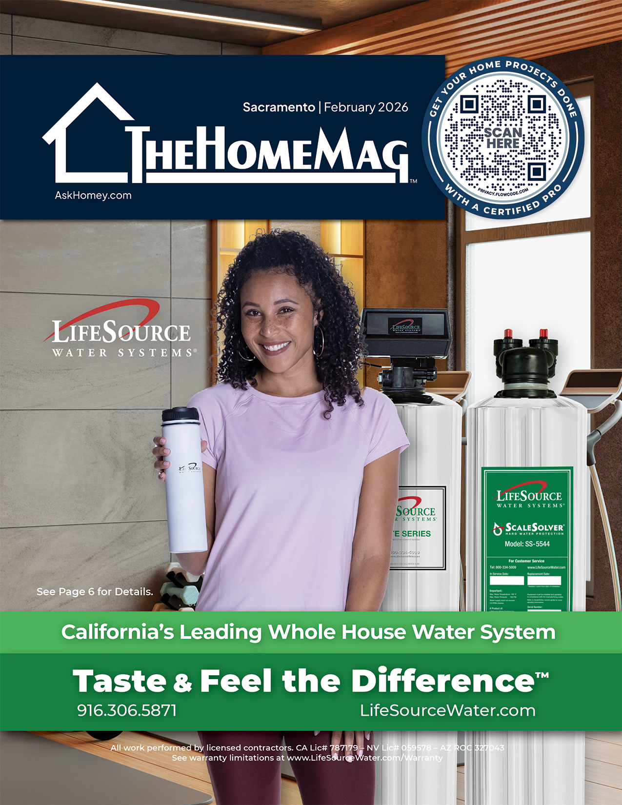 A woman holding a water filter in front of a water system with the LifeSource Water Systems logo, in a showroom setting.