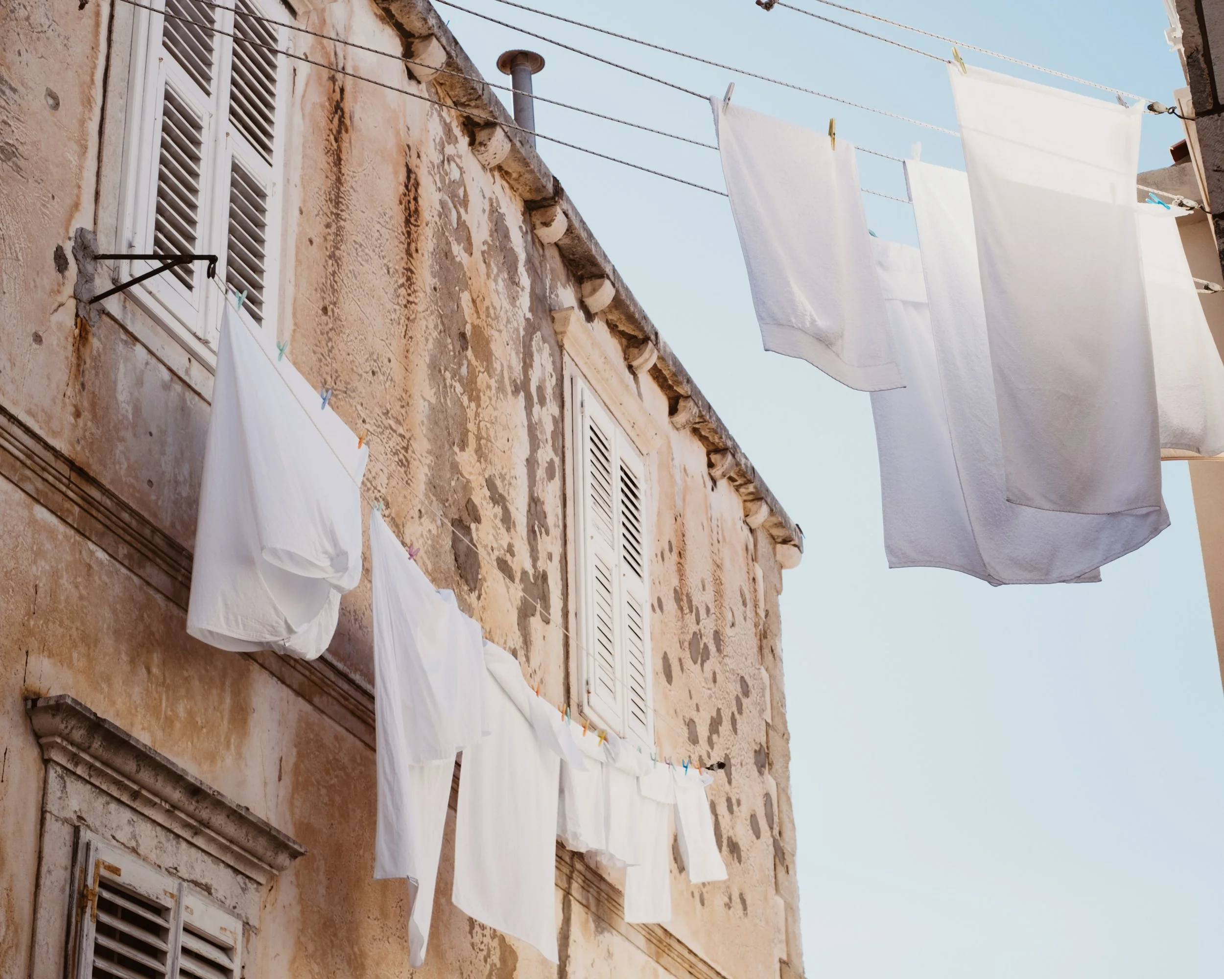 Fresh linen hanging out of the windows in Dubrovnik
