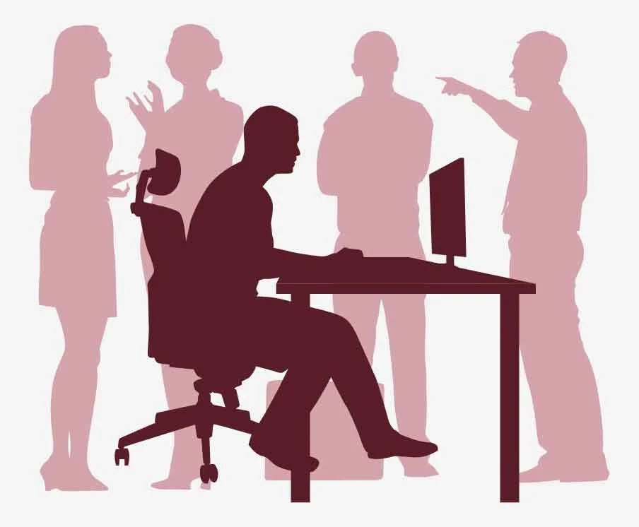 An illustration of the silhouettes of someone working at a desk with a monitor and people standing in the background.