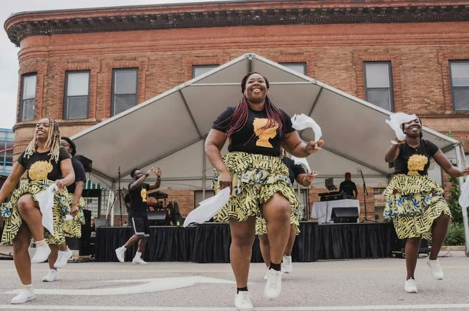 Afrocontigbo dancers at the Tamu Stage of 2025 Open Streets Cedarfest — a celebration of community, culture, and a car-free space. 