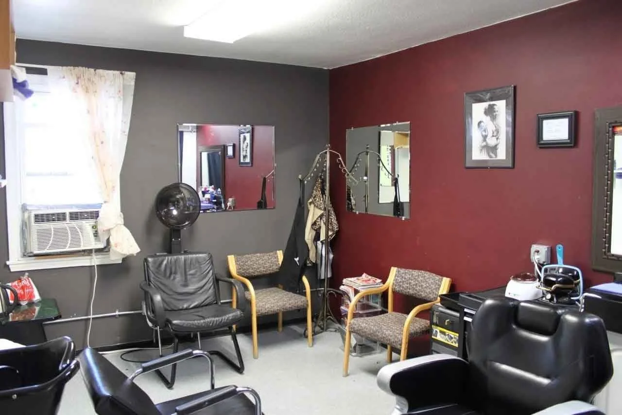 The interior of a barbershop.