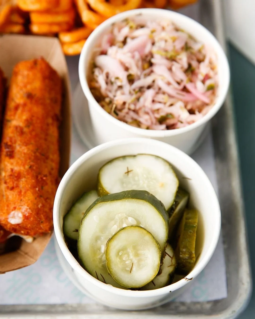 Let's hear some love for the sides 📢 Round out your meal with some of our delicious sides. Curly fries, mozz sticks, pickles, and slaw make the perfect add-ons to your Milk Drunk feast! But don't forget the dipping sauces! All sides and sauce made i