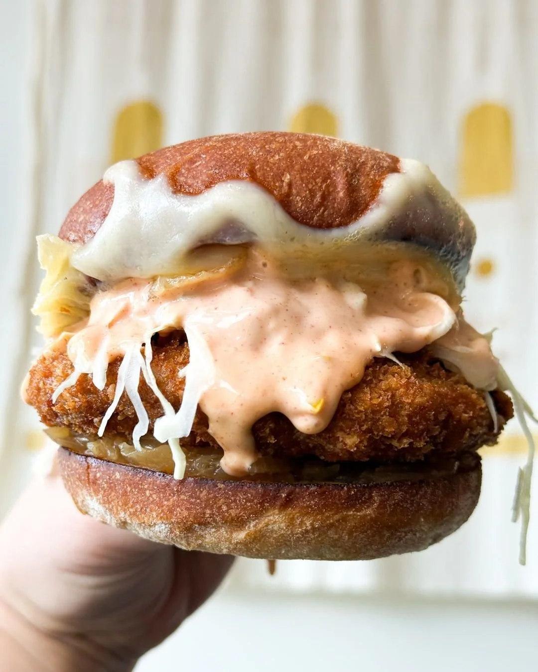 End the year on a high note with our seasonal sandwich, The Katsu Melt! We fry a katsu beef patty and top it with swiss cheese, caramelized onions, shaved cabbage, and Thousand Island dressing. A limited number made each day, so snag yours while you 