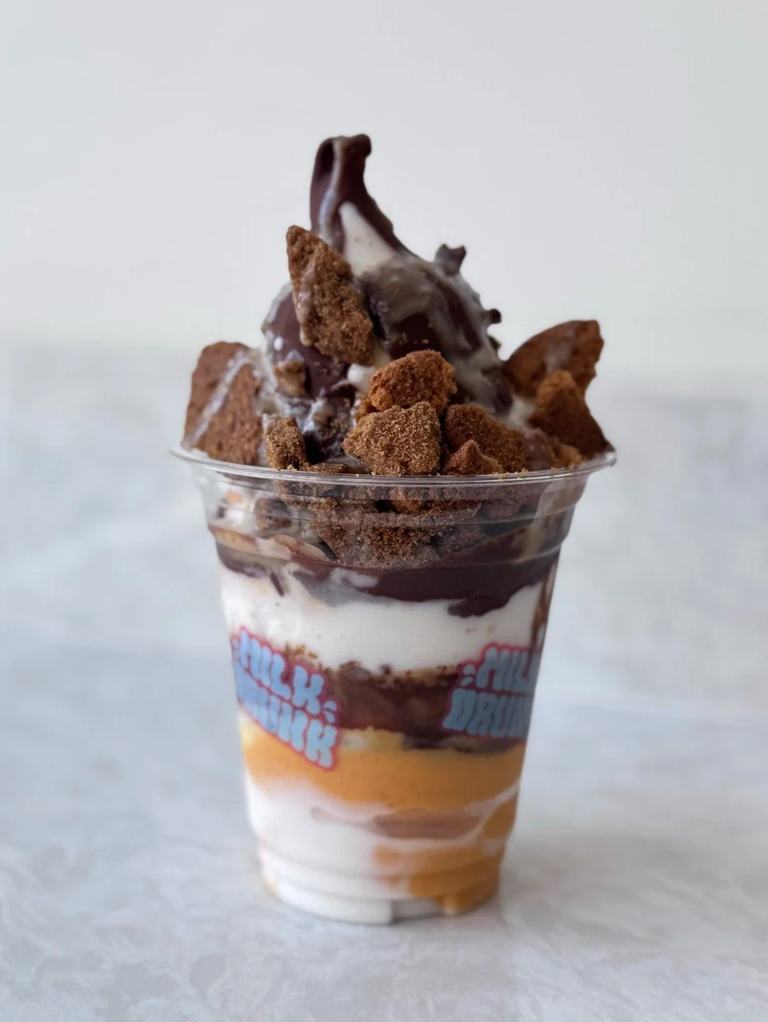 With Carrot Cake and Coconut being our seasonal soft serve flavors, it's only natural that the April Sunday Sundae is a (you guessed it) 🥥 Coconut Carrot Cake Sundae! 🥕 It has layers of our seasonal swirl, walnut butter, chocolate hard shell, and g