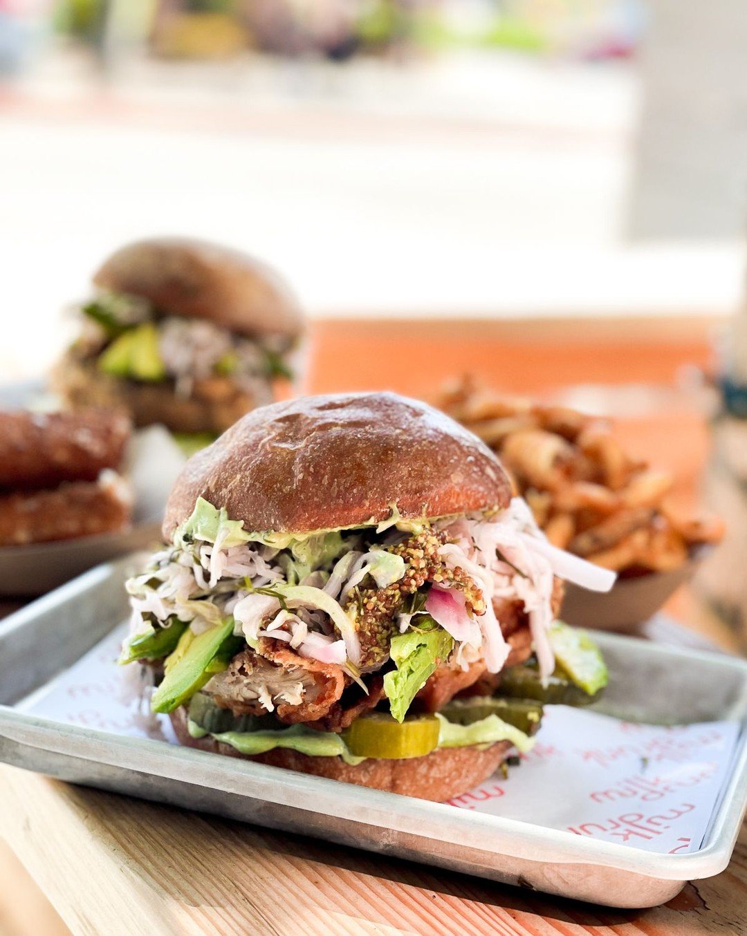 The Original didn't become our top selling sandwich for no reason. Our crispy fried chicken is married with crunchy zing of the mustard seed slaw and dill pickles plus creamy avocado and green aioli. A green machine of savory perfection! 💚