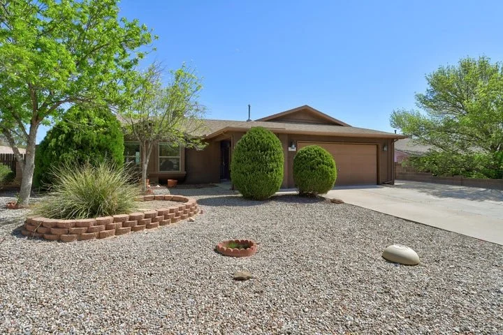 One Story Brown Two Car Garage House Rio Rancho, New Mexico