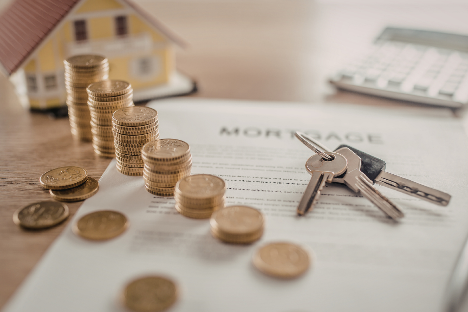 Mortgage paperwork with keys and money