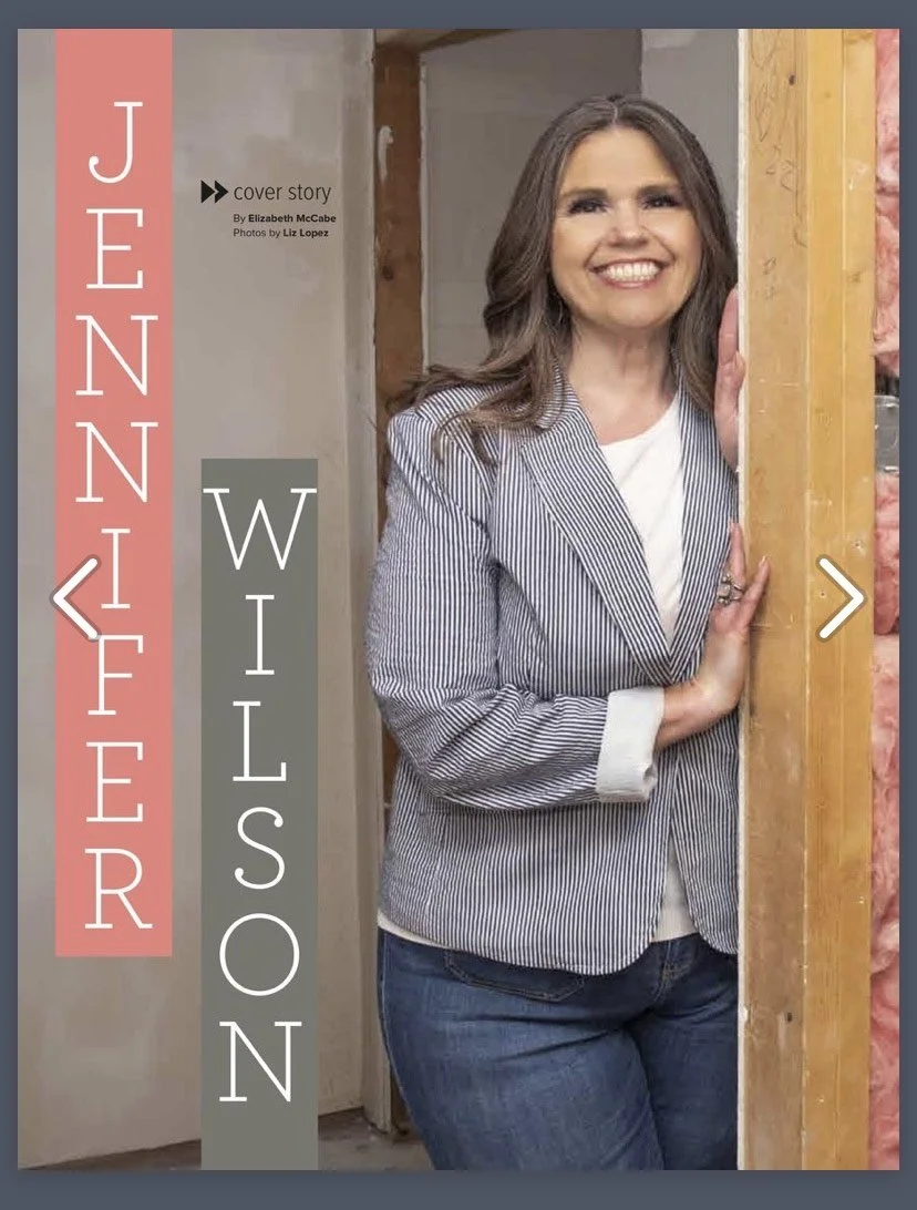 Cover of a magazine featuring a woman smiling, titled 'Jennifer Wilson', with the subtitle 'WILSON'.