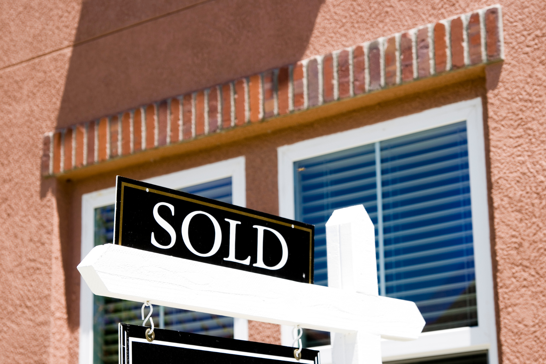 Sold sign on home