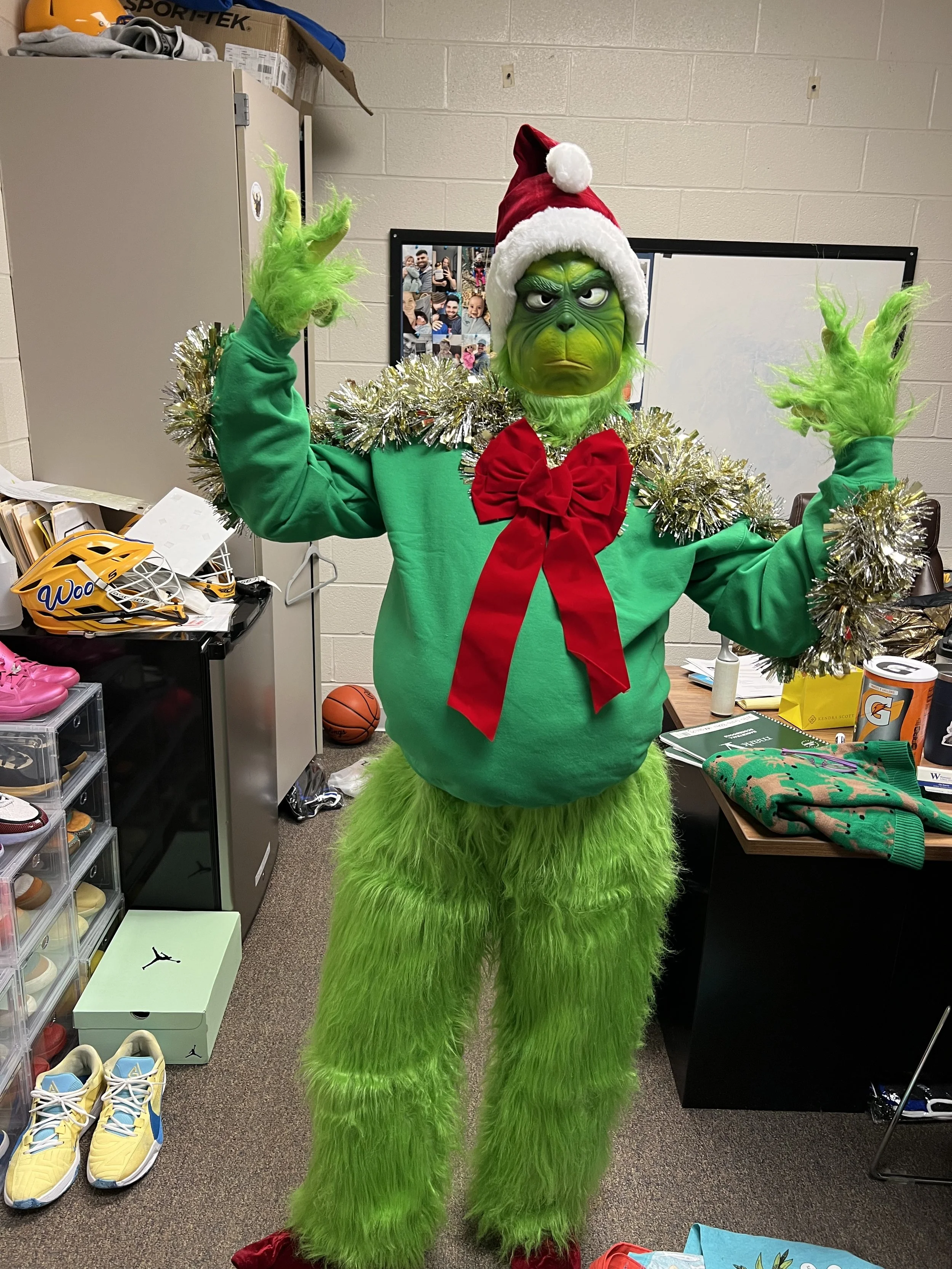 I played the Grinch and won the ugly sweater contest.JPG