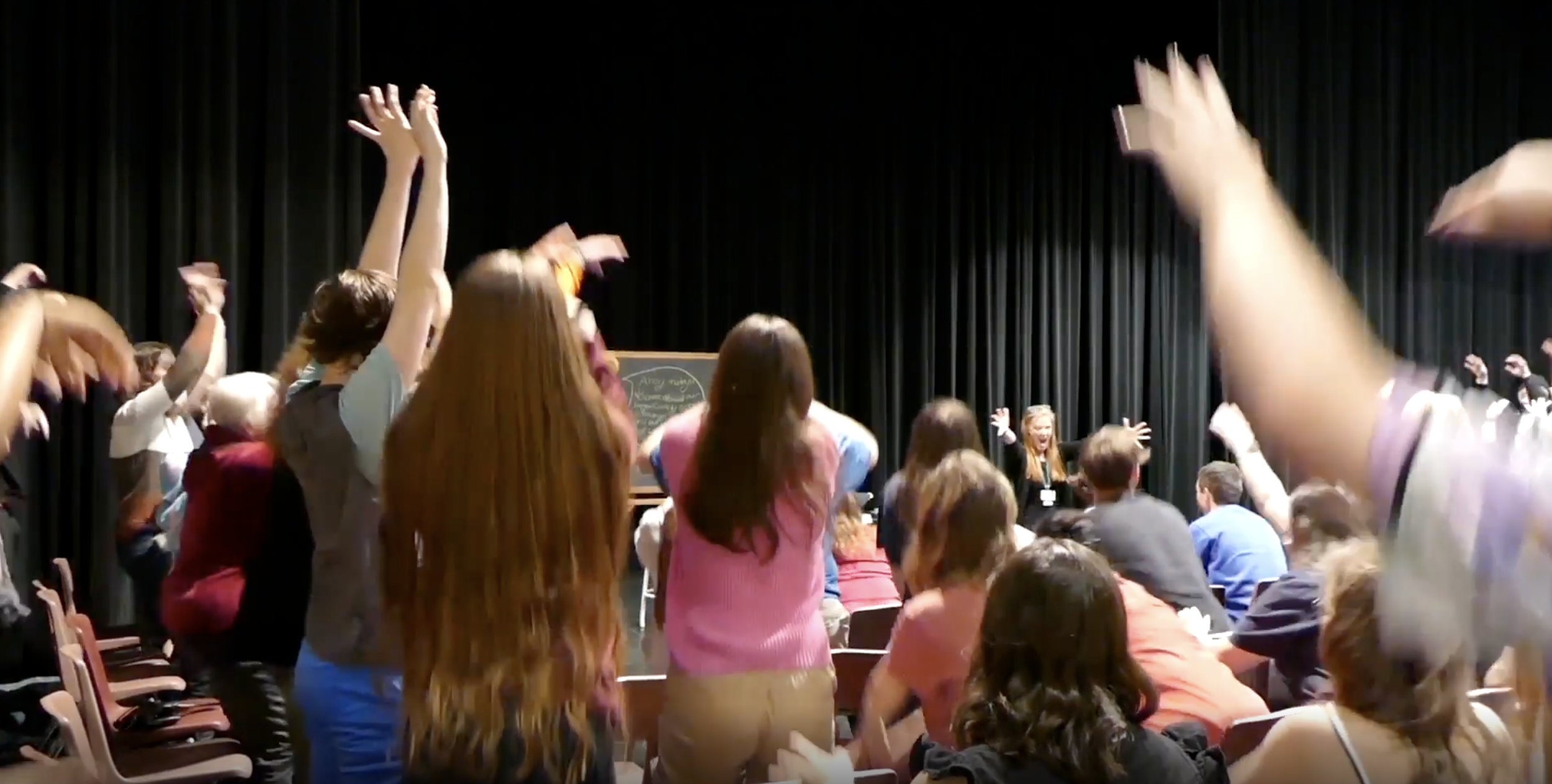 audience warm up at an Improv Showcase.png