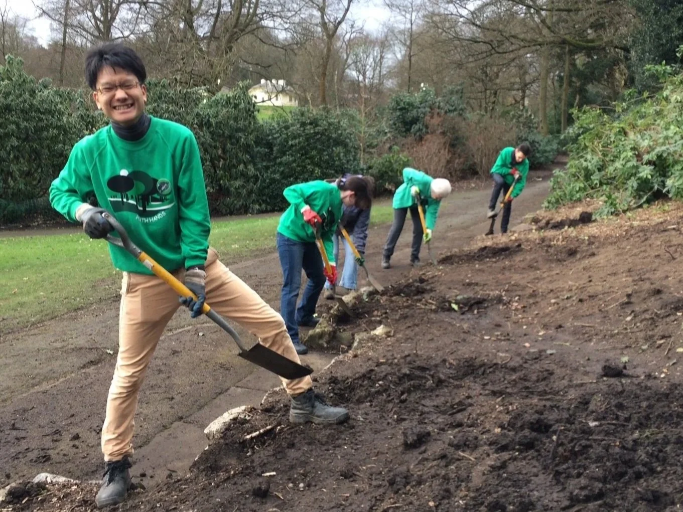 volunteers digging
