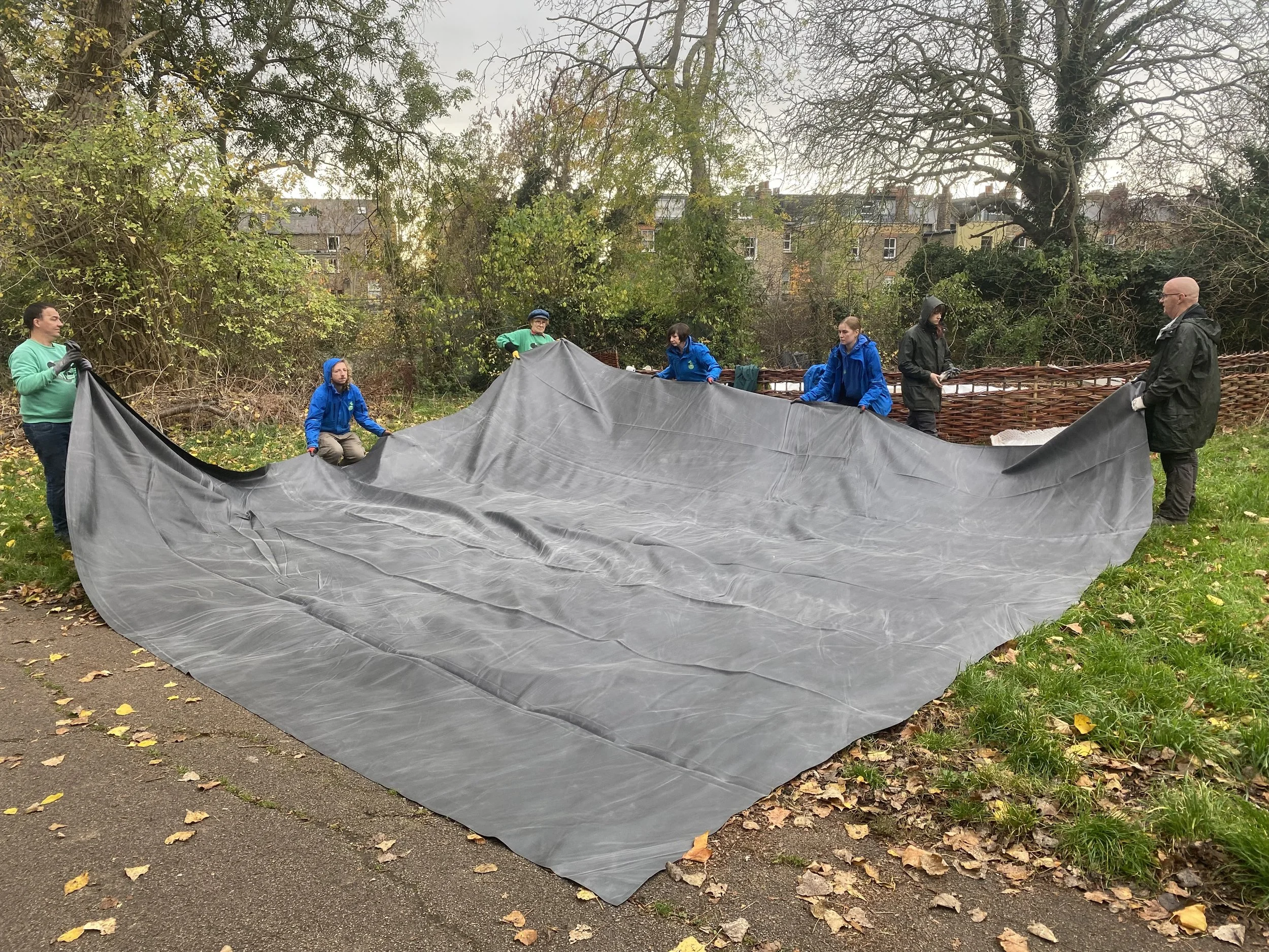 Laying pond liner