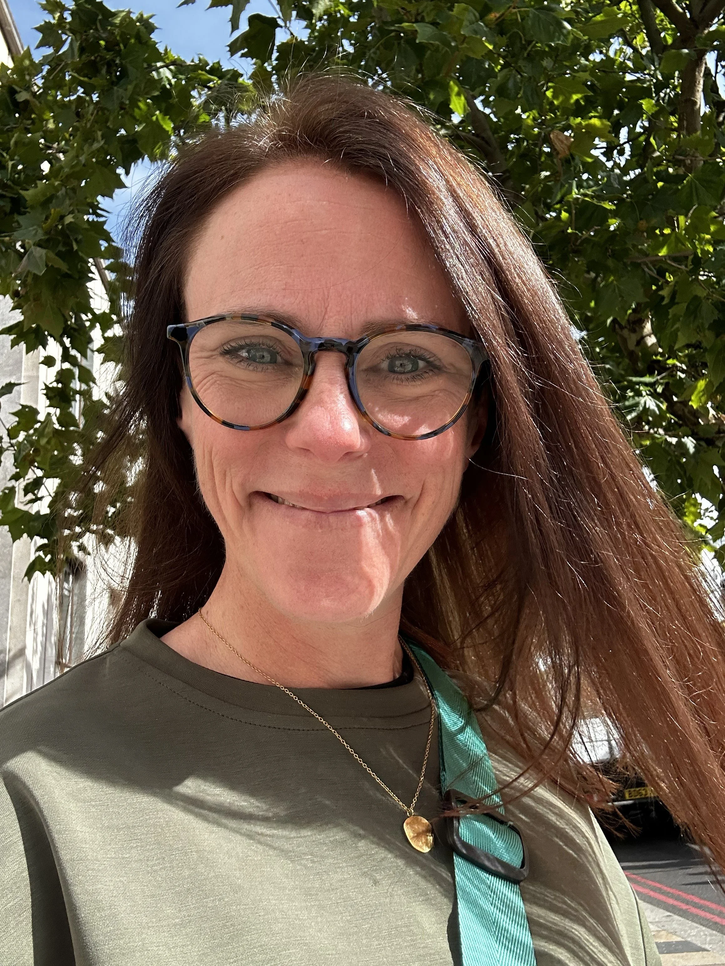 Johanna Courtney, founder of The Digital CMO, smiling outdoors in South London.