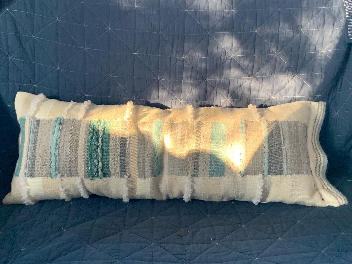 A bolster whose colors were inspired by the sea for a home in the desert!
