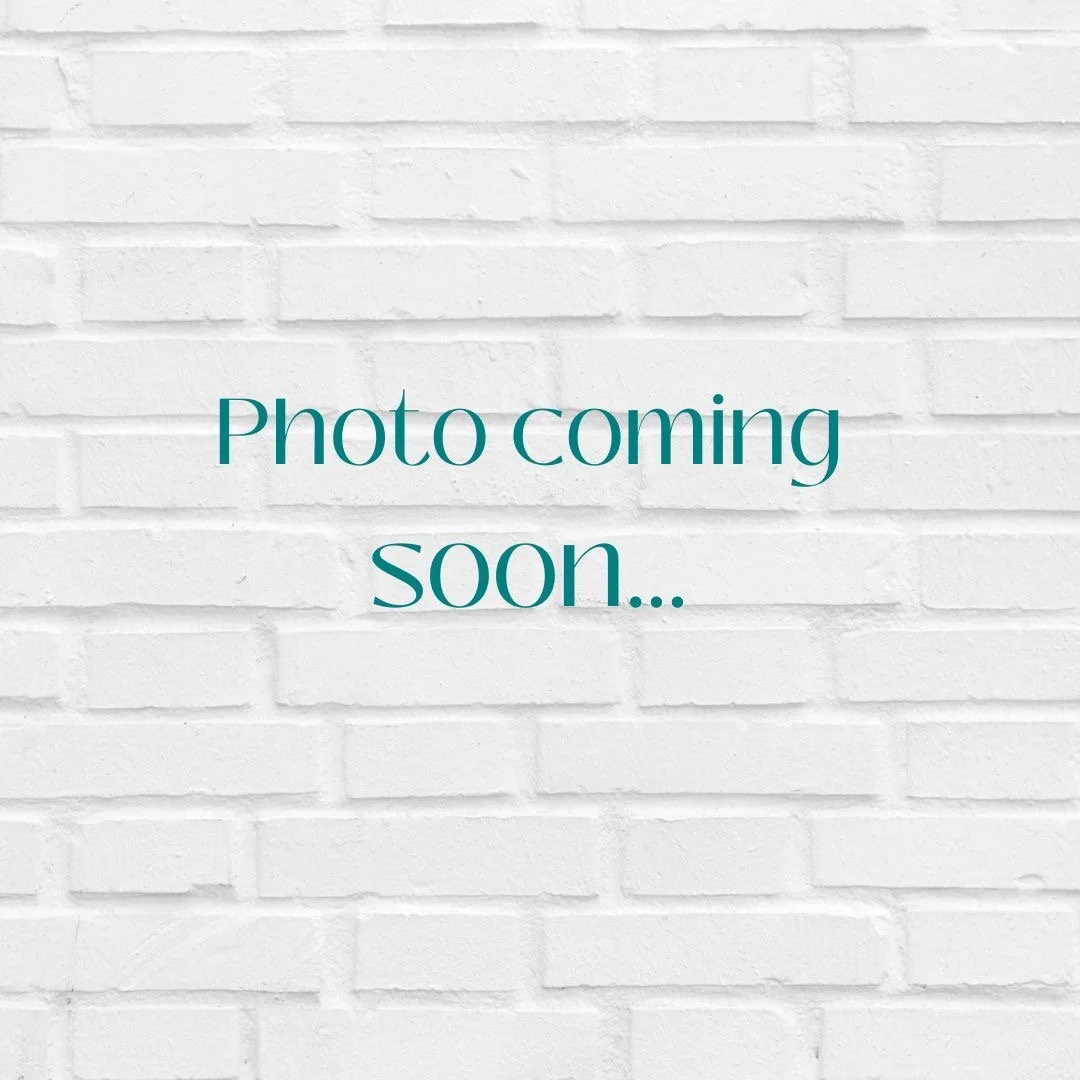 Colorful watercolor illustration with a paint palette and paint splashes. Text reads 'A splash of color!' with 'color' in rainbow colors.