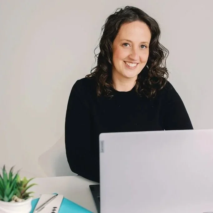 Annie Hanson, founder of Mindfully Money, inviting you to join Break Free From Debt