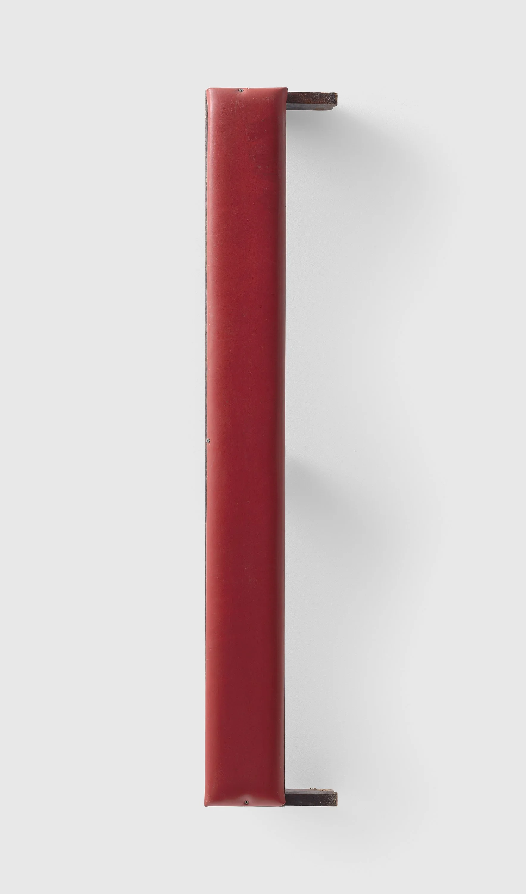 a rite of honor, 2025. 
Reclaimed pew kneeler. 
51 5/8 x 9 1/2 x 7 (1/2131.1 x 24.1 x 19.1 cm).